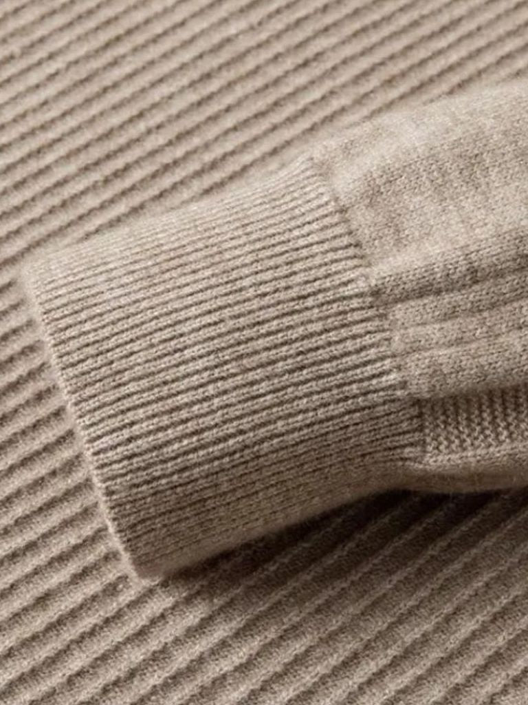 Pull en laine à rayures et fermeture éclair quart de tour